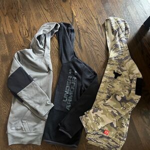 Under Armour and Nike Jordan sweatshirts.